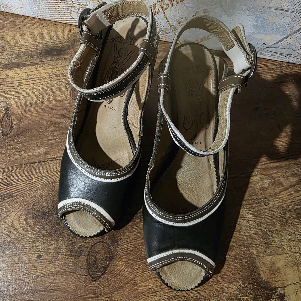 Fly Girl by Fly London wedge style sandals. Brown, black, and white leather.